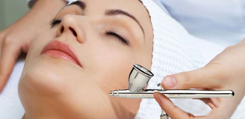 Womans face undergoing laser treatment